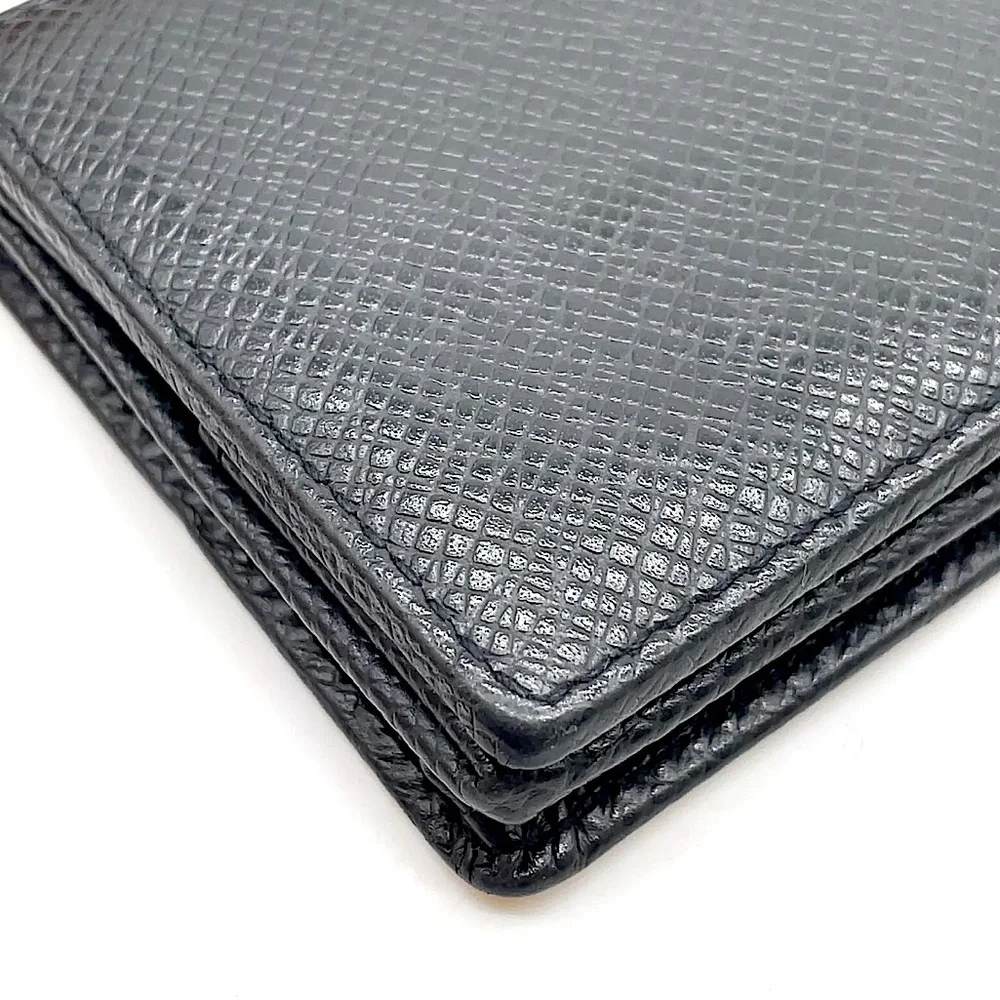 LOUIS VUITTON Black Taiga Porte Monnaie Boite COMES WITH: LV BOX, DUST BAG